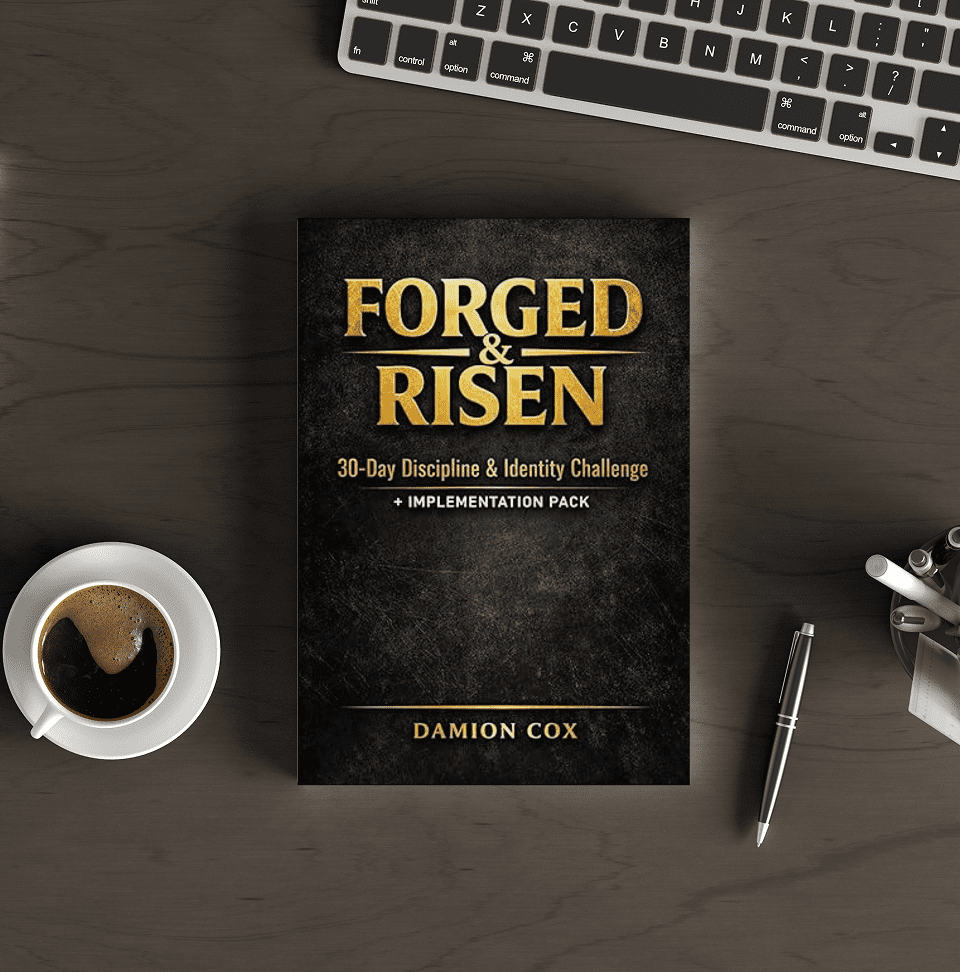 Book on desk with coffee and keyboard